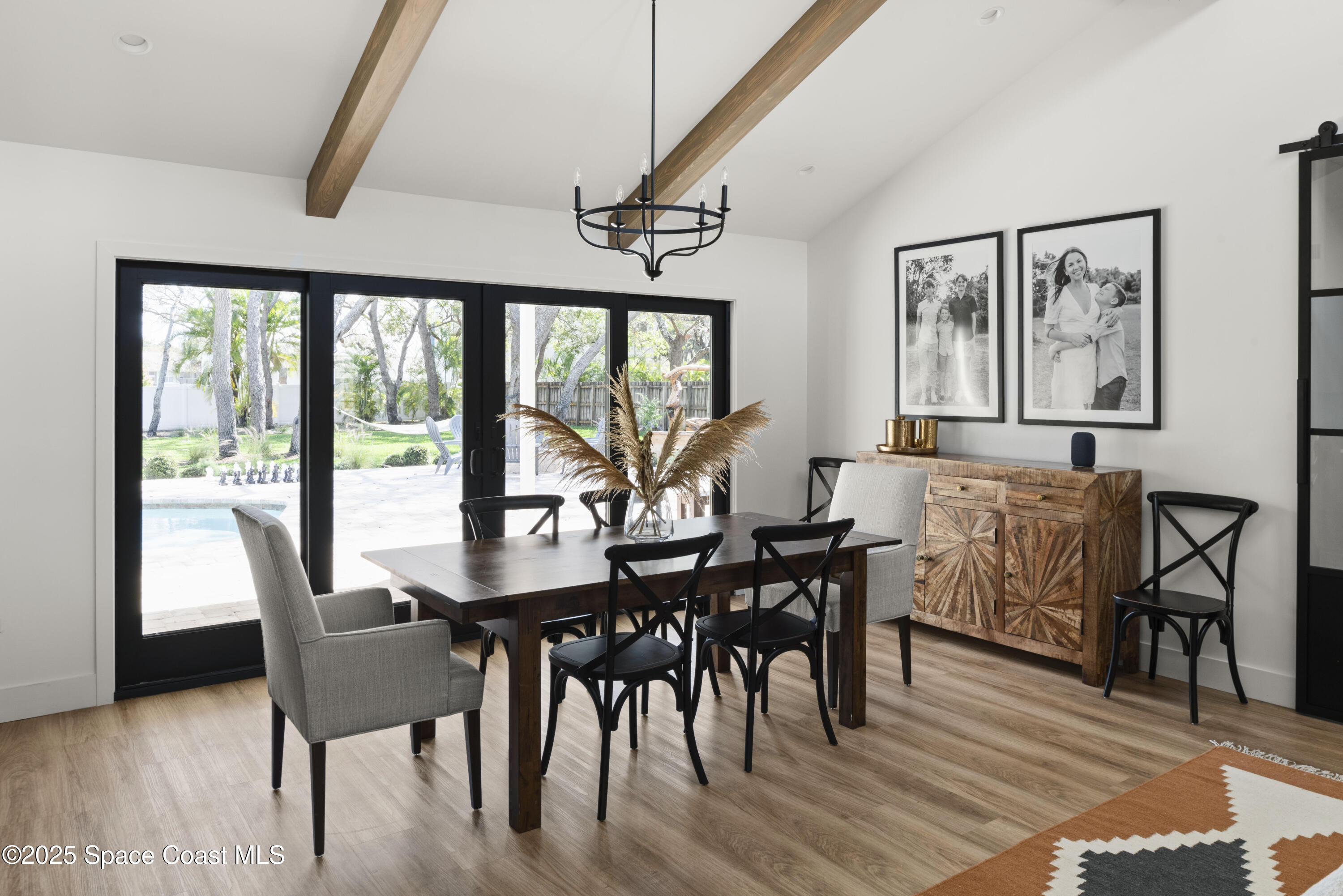 3425 Kent Drive Melbourne, FL 32935 - Photo 8 of 21 a view of a dining room with furniture window and wooden floor