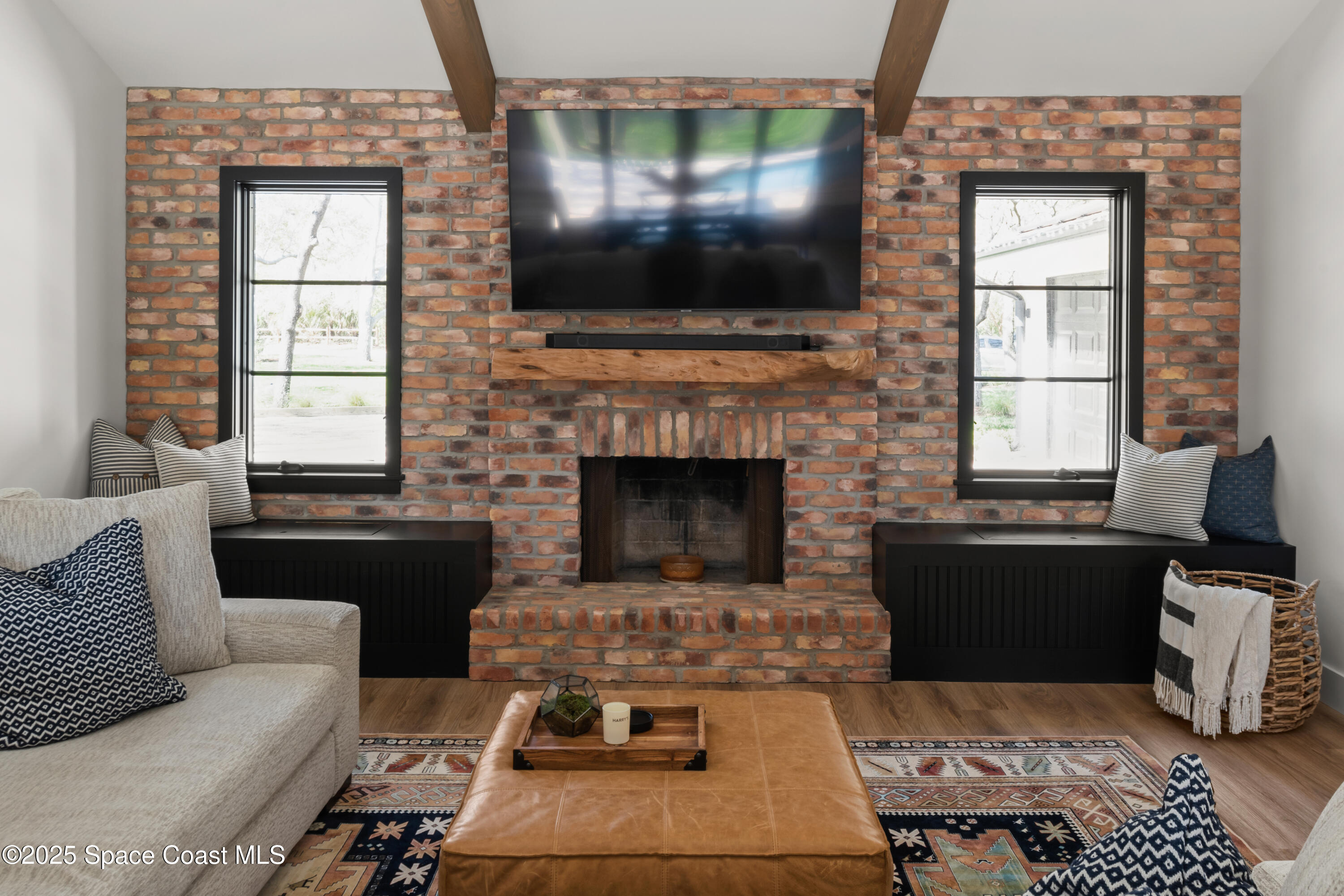 3425 Kent Drive Melbourne, FL 32935 - Photo 10 of 21 a living room with furniture fireplace and flat screen tv