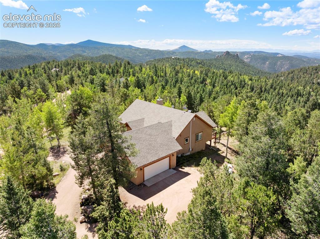 131 Paradiso Road Divide, CO 80814 - Photo 4 of 50 a view of a city with a mountain
