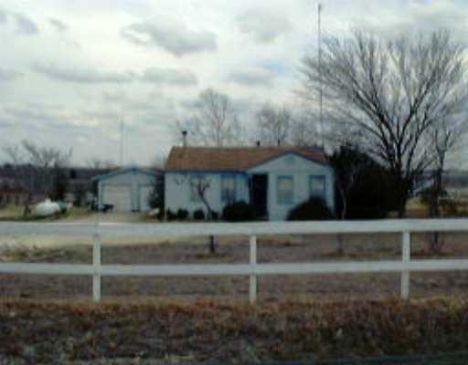 16221 Cameron Road Pflugerville, TX 78660 - Photo 1 of 1 a front view of a house with a yard