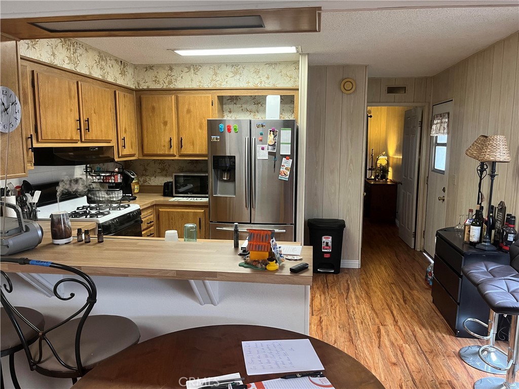 775 Terrace Lake Drive Brea, CA 92821 - Photo 7 of 10 a kitchen with lots of counter top space and furniture