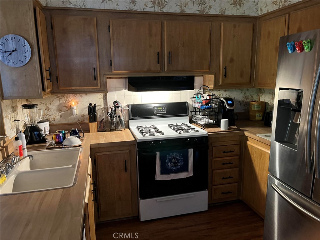 775 Terrace Lake Drive Brea, CA 92821 - Photo 10 of 10 a kitchen with a sink a stove and cabinets
