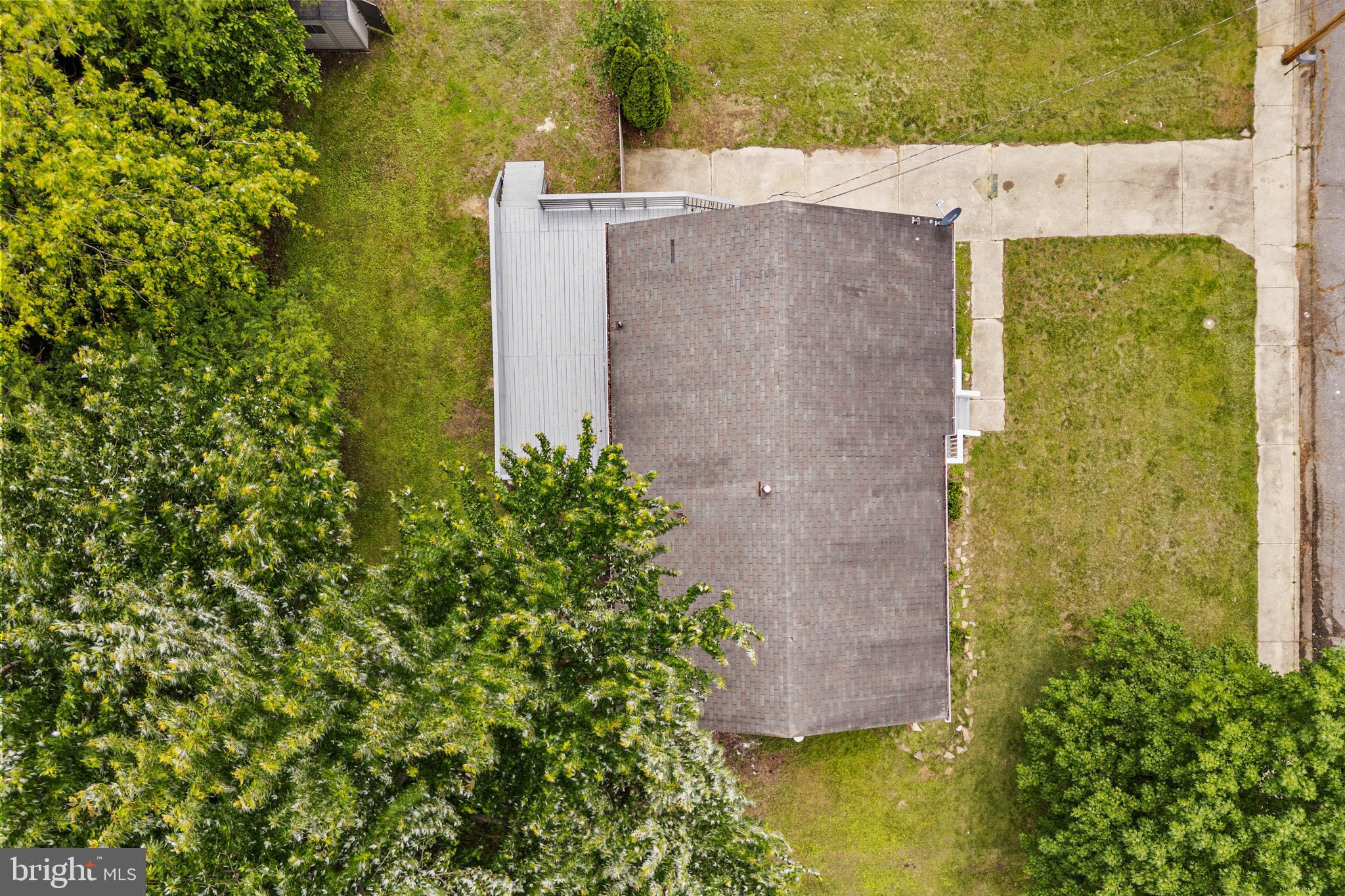 88 Delaware Drive Pennsville, NJ 08070 - Photo 26 of 26 an aerial view of residential house with outdoor space and trees all around