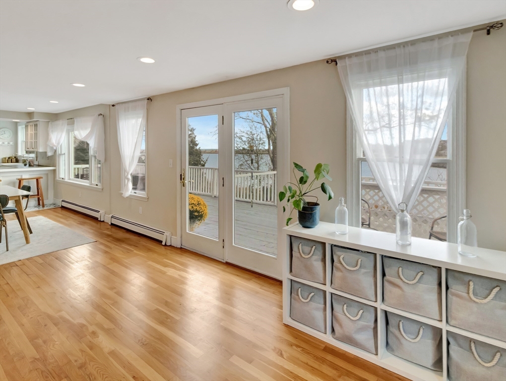 54 Salisbury Street Hull, MA 02045 - Photo 11 of 38 a view of livingroom with furniture window and wooden floor