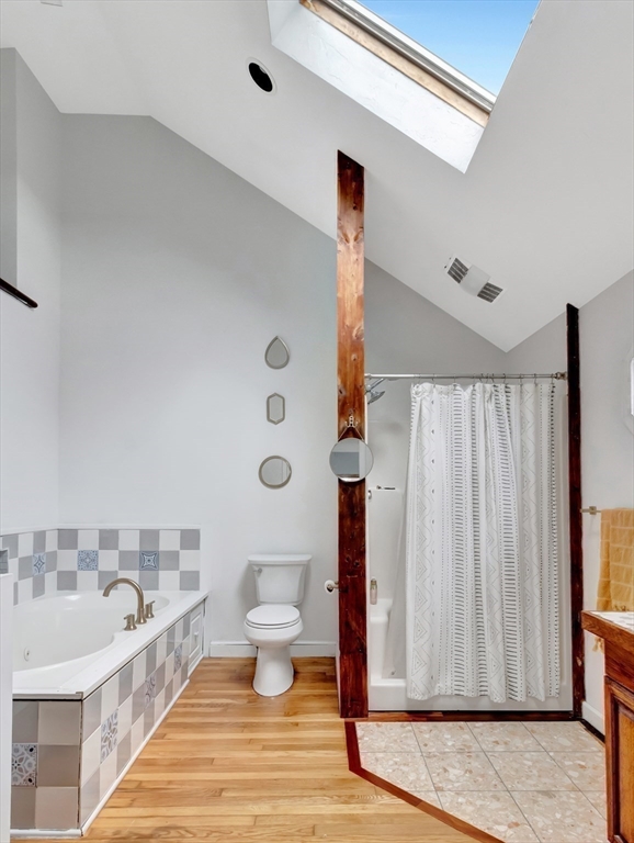 54 Salisbury Street Hull, MA 02045 - Photo 18 of 38 a spacious bathroom with a bathtub and shower