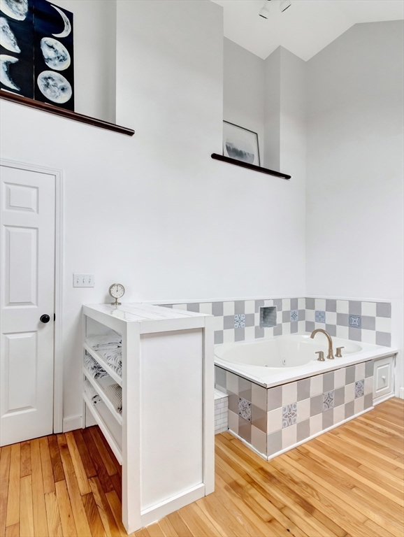 54 Salisbury Street Hull, MA 02045 - Photo 20 of 38 a view of a kitchen cabinets and a wooden floor