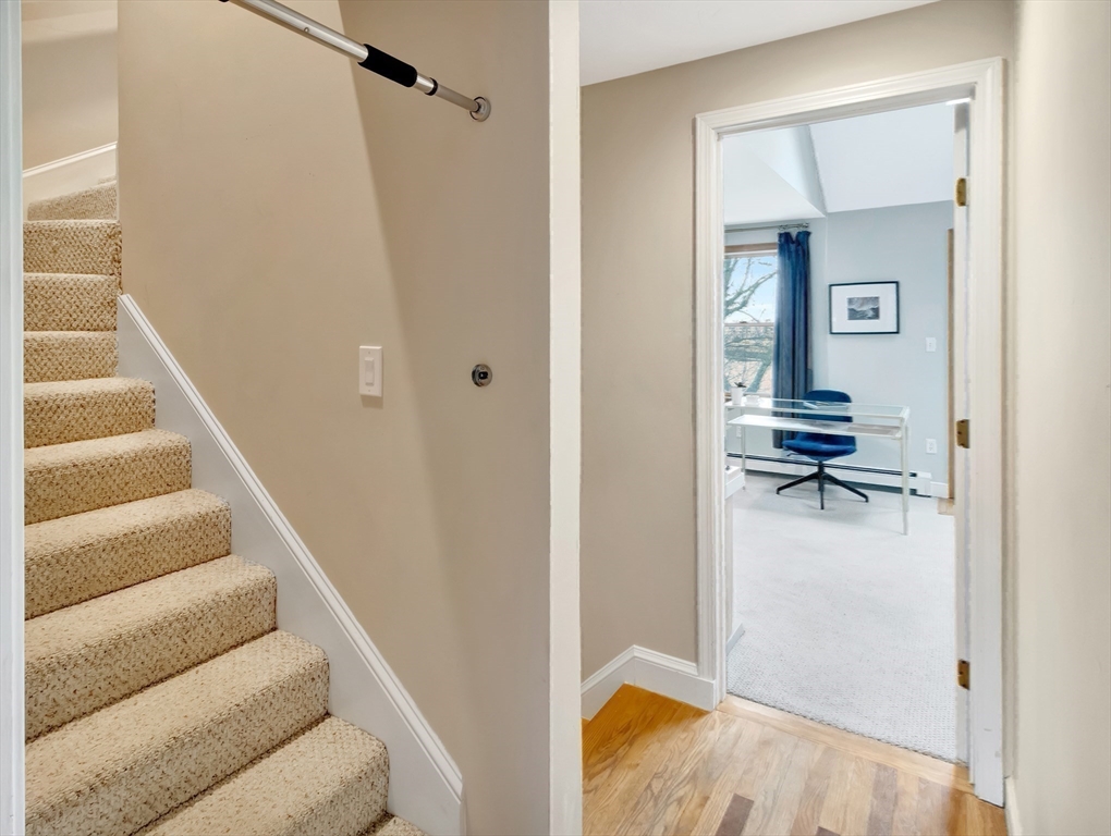 54 Salisbury Street Hull, MA 02045 - Photo 21 of 38 a view of a hallway with staircase and living room