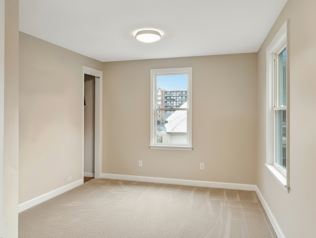 54 Salisbury Street Hull, MA 02045 - Photo 28 of 38 an empty room with windows