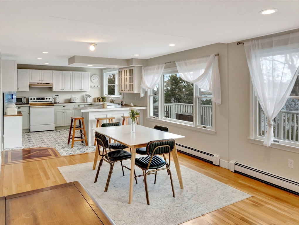 54 Salisbury Street Hull, MA 02045 - Photo 9 of 38 a view of a dining room with furniture window and wooden floor