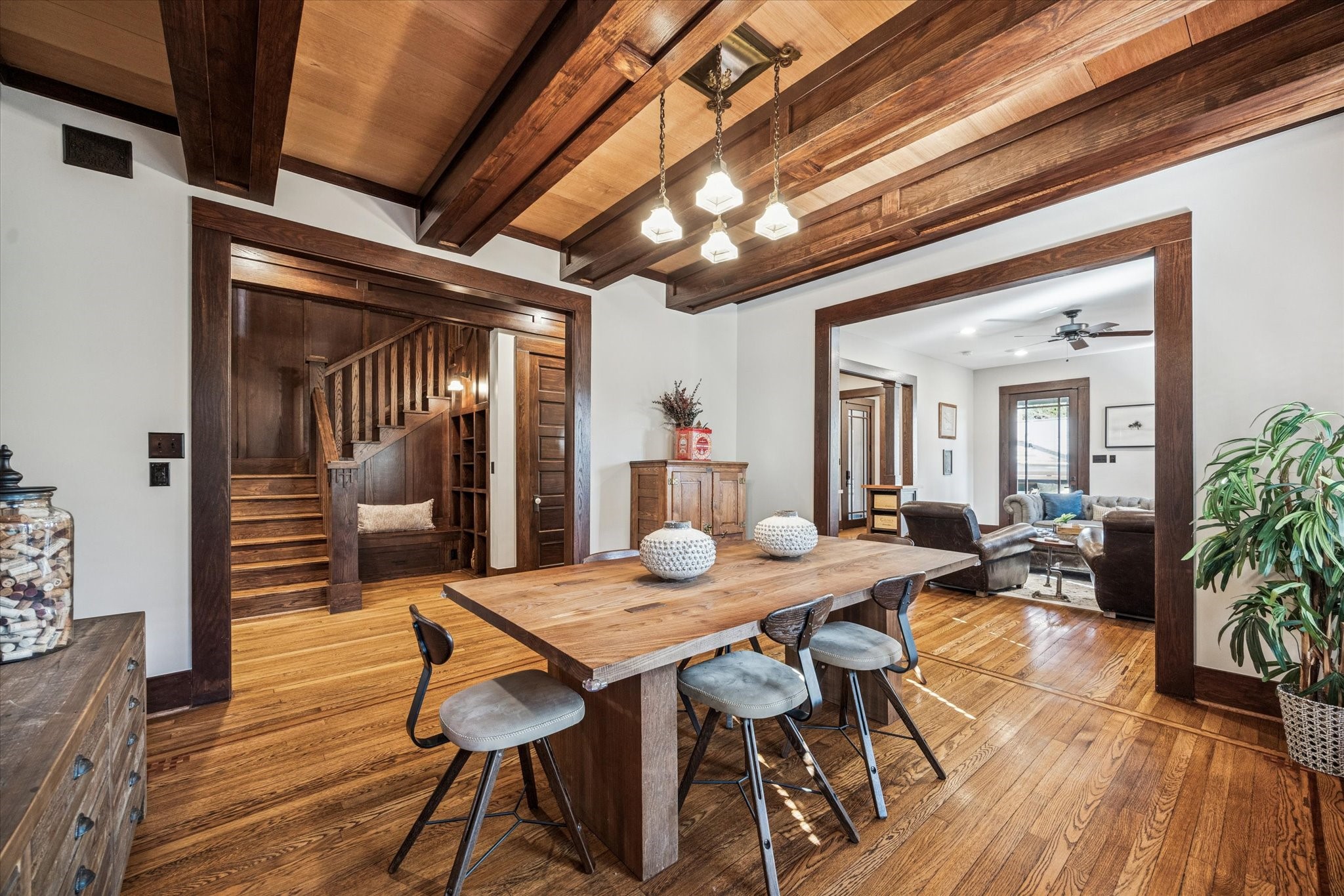 512 Archer Street Houston, TX 77009 - Photo 8 of 40 An additional view of the stunning dining room with a wood inlay on the floor and an antique light fixture anchoring the room.