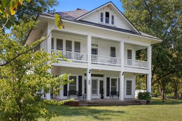 front view of a building with a fountain