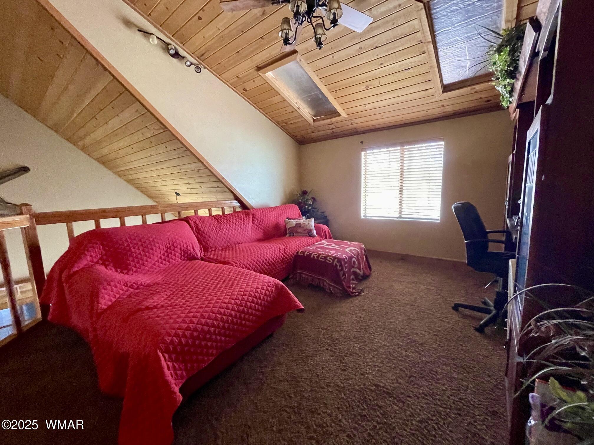 183 North Becker Lake Road Springerville, AZ 85938 - Photo 25 of 41 a bed room with a bed and a chair