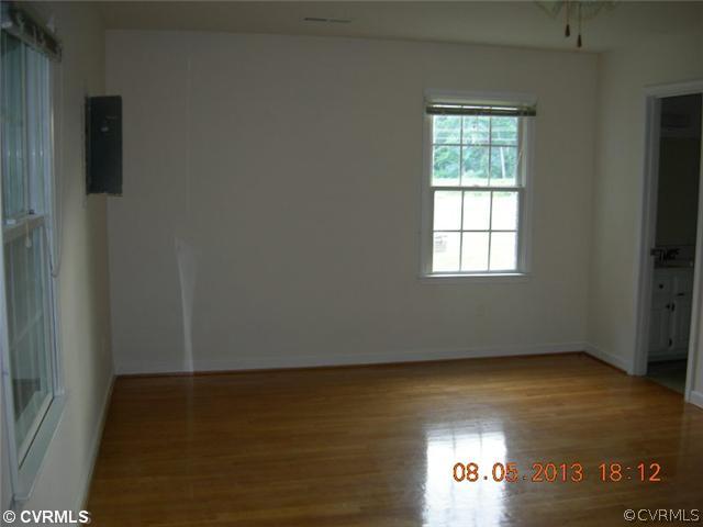 19029 Malones Road Carson, VA 23830 - Photo 6 of 11 an empty room with a window