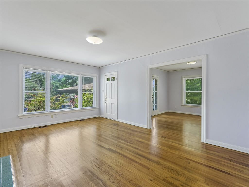 2323 Hartford Road, Unit A Austin, TX 78703 - Photo 4 of 15 Gleaming hardwood floors and an open entryway highlight this versatile living area.