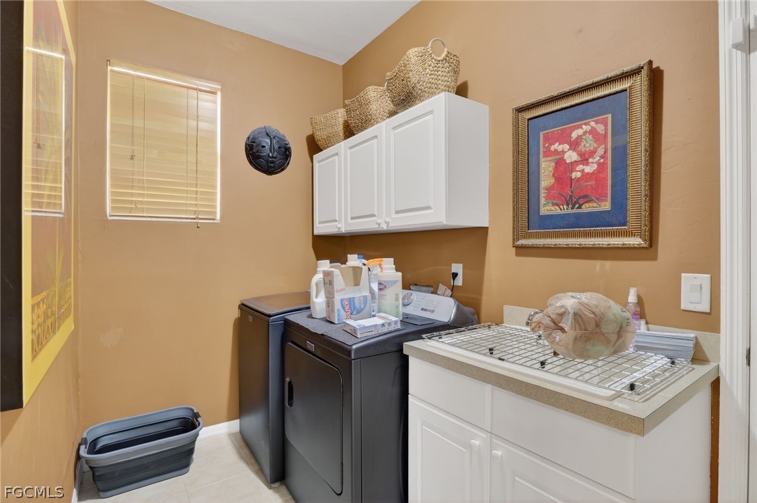 4914 Southwest 25th Court Cape Coral, FL 33914 - Photo 18 of 22 a bathroom with a sink a vanity and a window