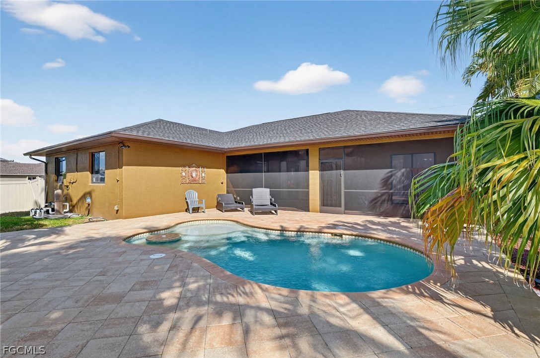 4914 Southwest 25th Court Cape Coral, FL 33914 - Photo 22 of 22 a view of a house with backyard and porch