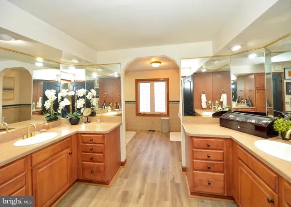 a bathroom with a bathtub and a sink