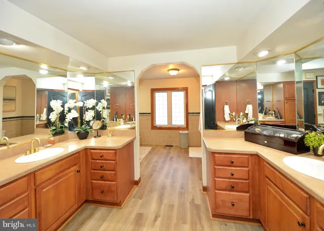 a bathroom with a bathtub and a sink