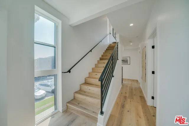 a view of entryway with wooden floor