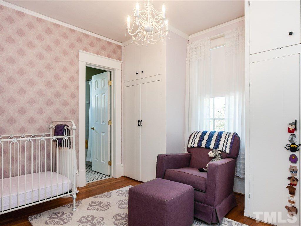 3400 Ruffin Street Raleigh, NC 27607 - Photo 16 of 21 a bedroom with furniture and a window