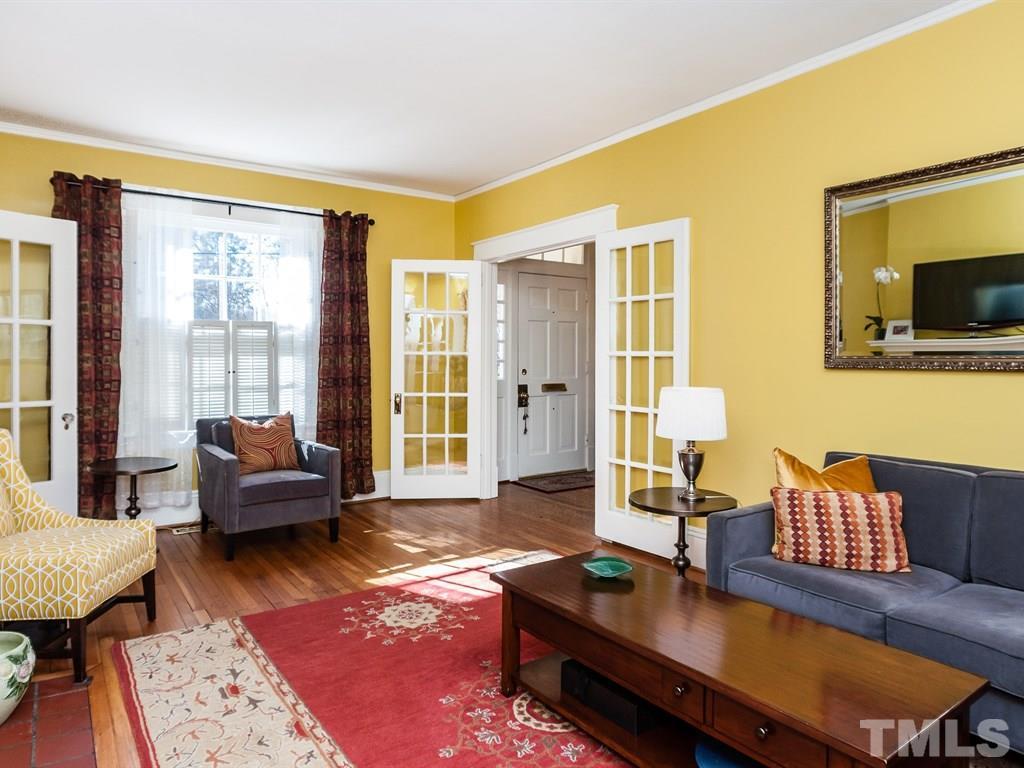 3400 Ruffin Street Raleigh, NC 27607 - Photo 5 of 21 a living room with furniture and a flat screen tv