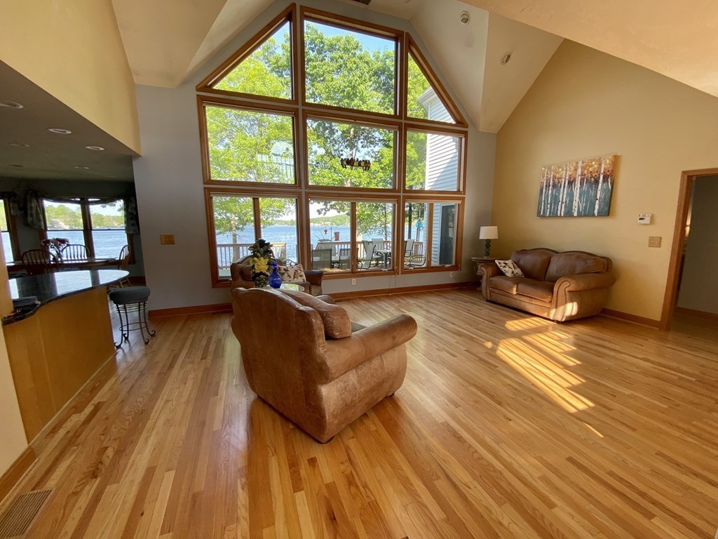 10 Cedar Lane Tyngsborough, MA 01879 - Photo 11 of 42 a living room with furniture and a large window