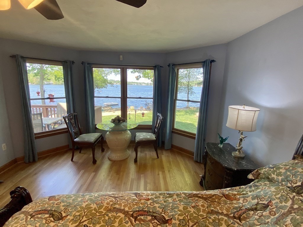 10 Cedar Lane Tyngsborough, MA 01879 - Photo 14 of 42 a living room with furniture and a wooden floor