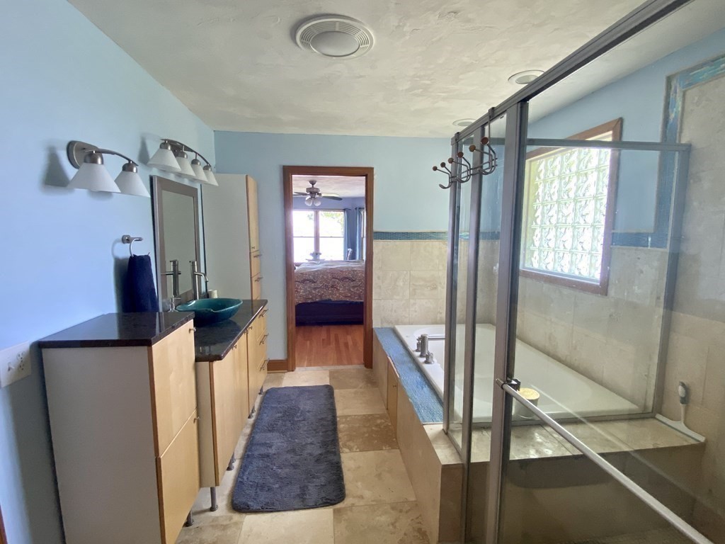 10 Cedar Lane Tyngsborough, MA 01879 - Photo 15 of 42 a view of a hallway with windows and stairs