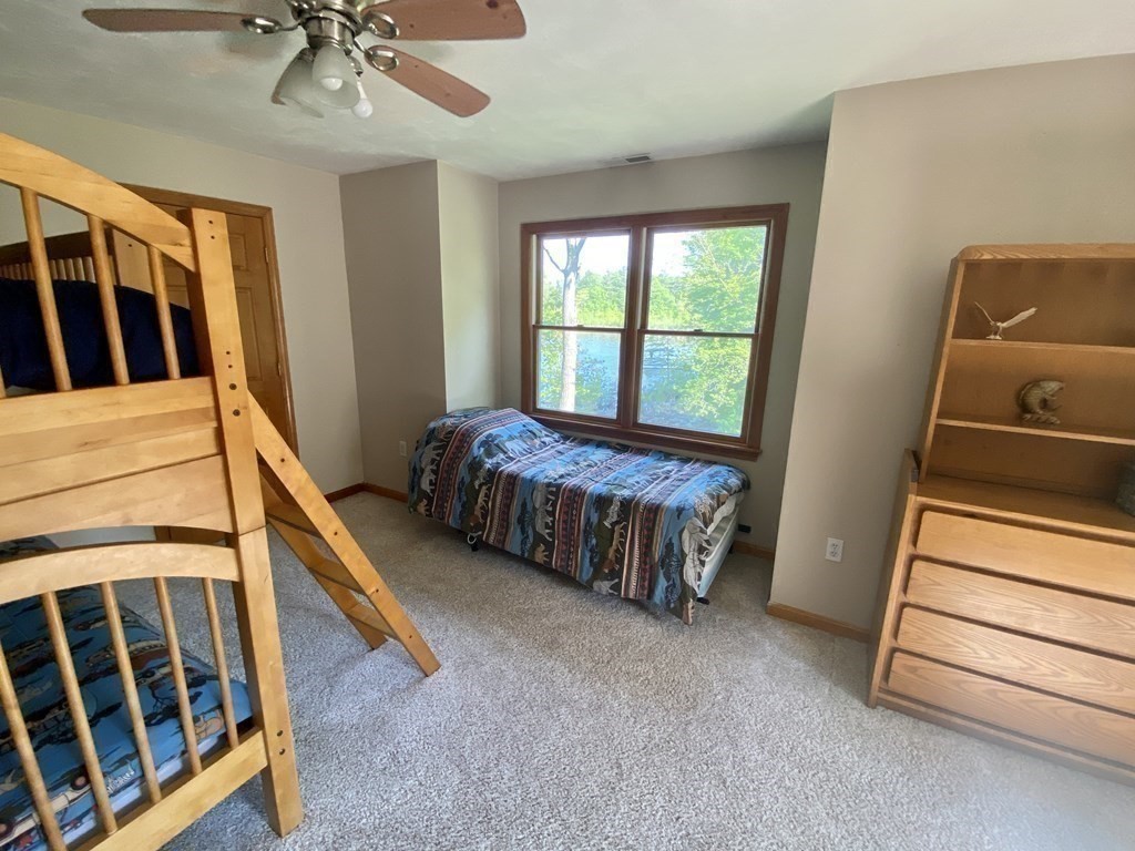 10 Cedar Lane Tyngsborough, MA 01879 - Photo 25 of 42 a bed room with a bed and a window