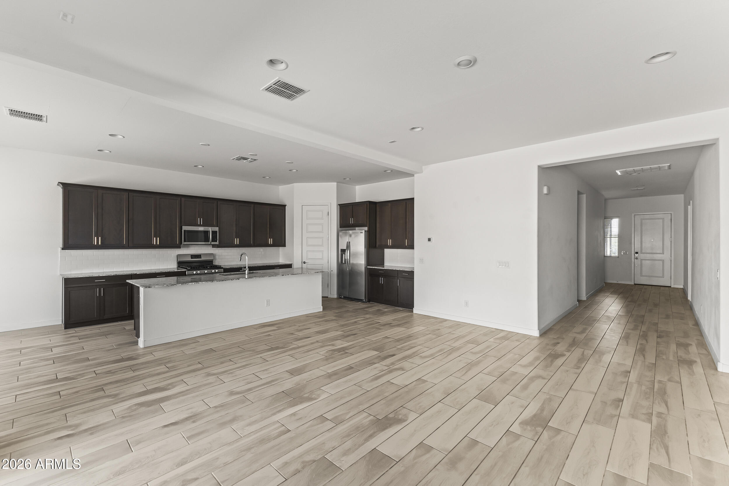 9342 West Roma Avenue Phoenix, AZ 85037 - Photo 12 of 34 Living Room/ Kitchen