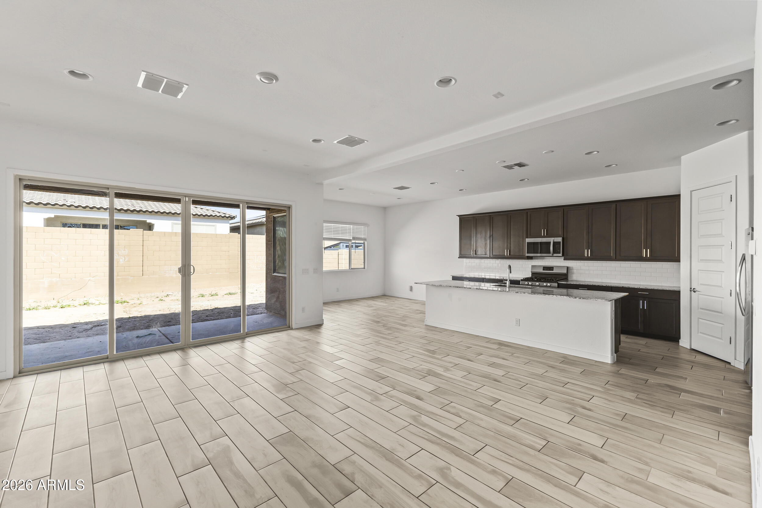 9342 West Roma Avenue Phoenix, AZ 85037 - Photo 13 of 34 Living Room/ Kitchen