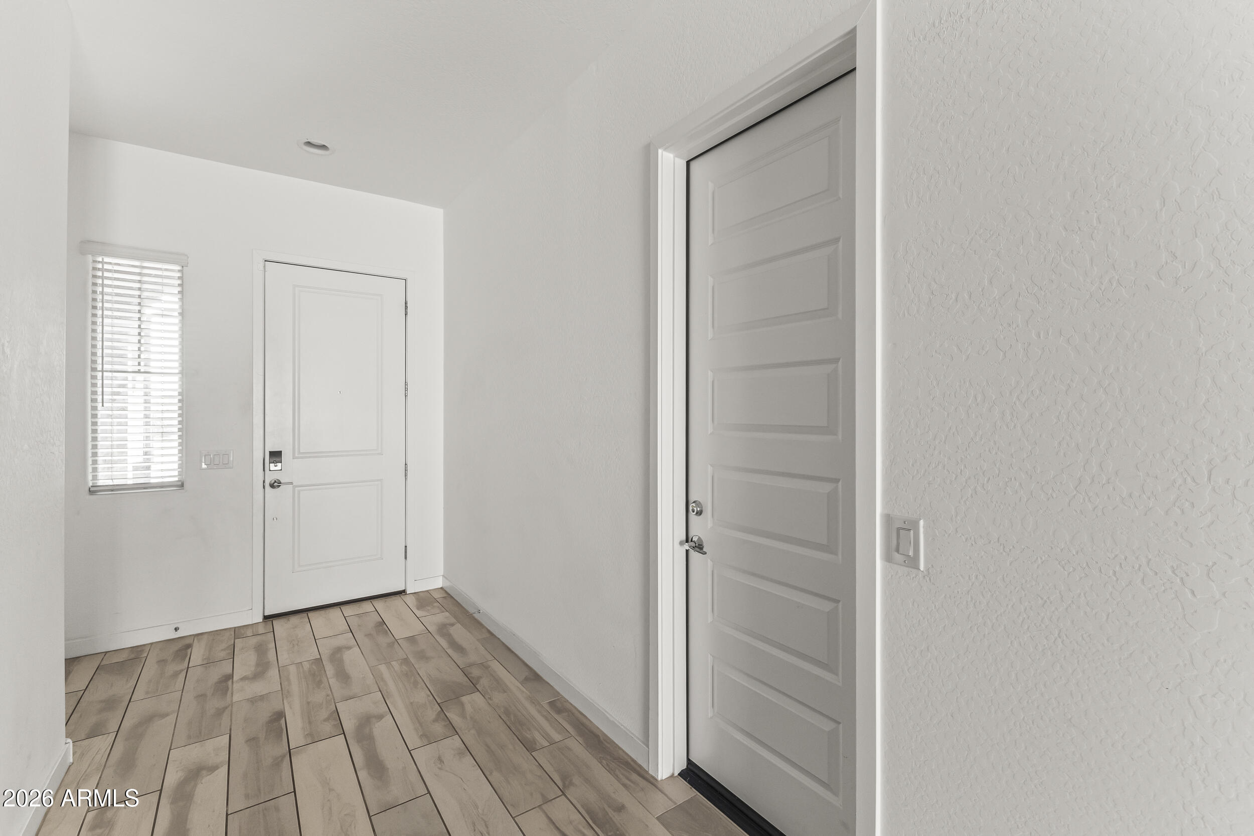 9342 West Roma Avenue Phoenix, AZ 85037 - Photo 26 of 34 Hallway/Next Gen Space