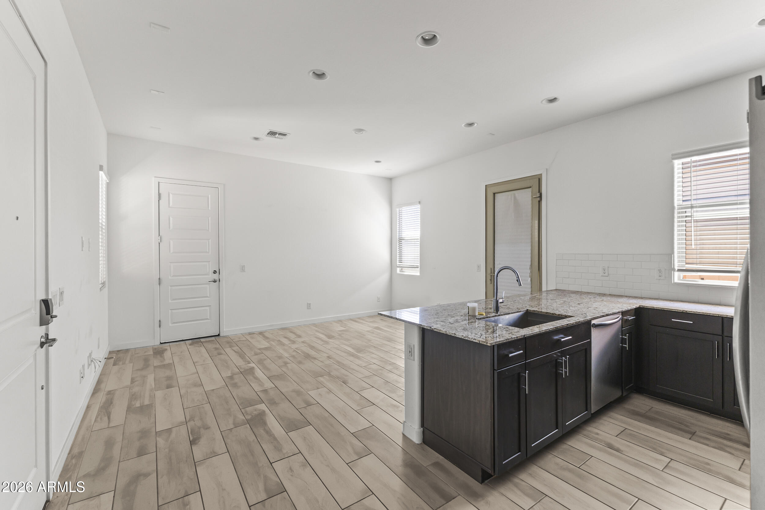 9342 West Roma Avenue Phoenix, AZ 85037 - Photo 30 of 34 Next Gen Kitchen/Living Room