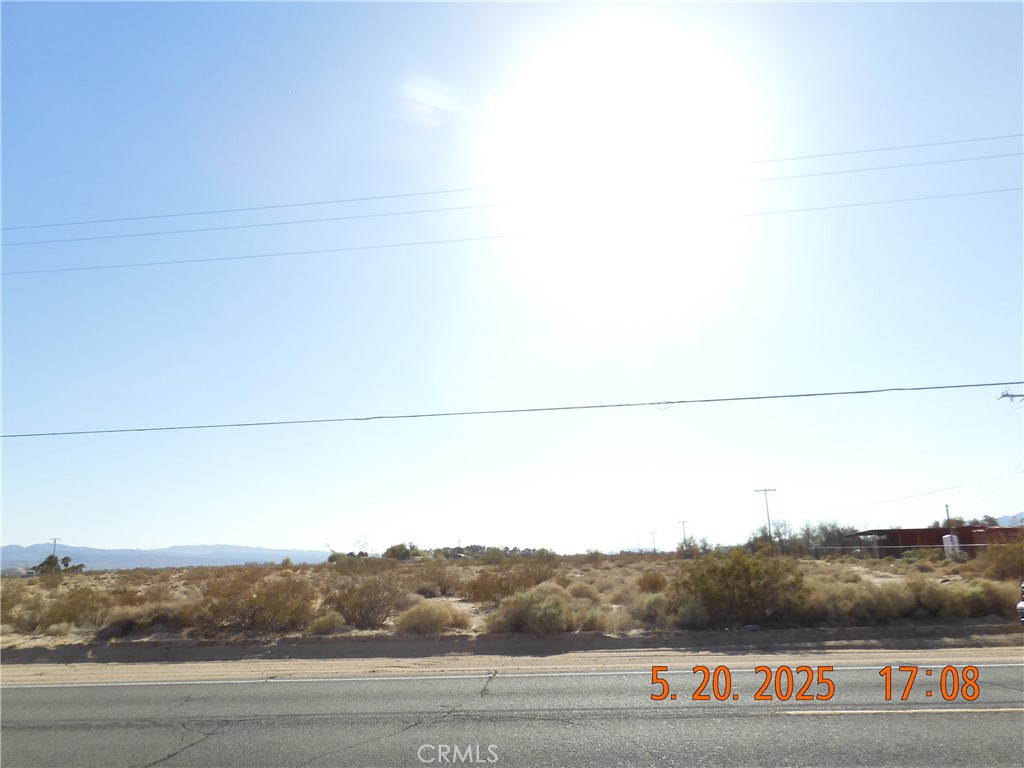 34174 Newberry Road Newberry Springs, CA 92365 - Photo 1 of 3 From Newberry Road, looking west across the property