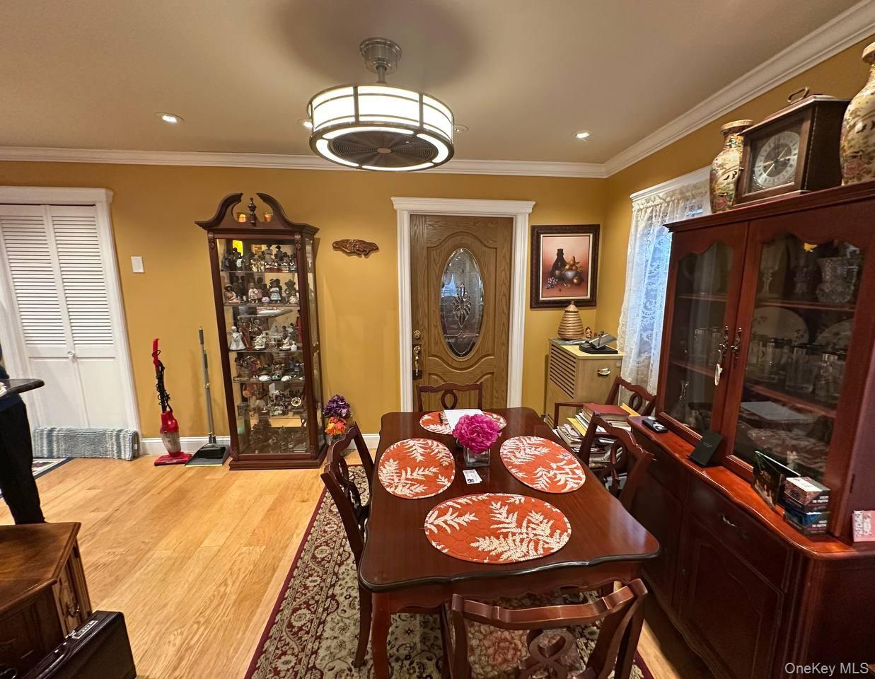 191-53 115th Road Queens, NY 11412 - Photo 4 of 16 a view of a dining room with furniture