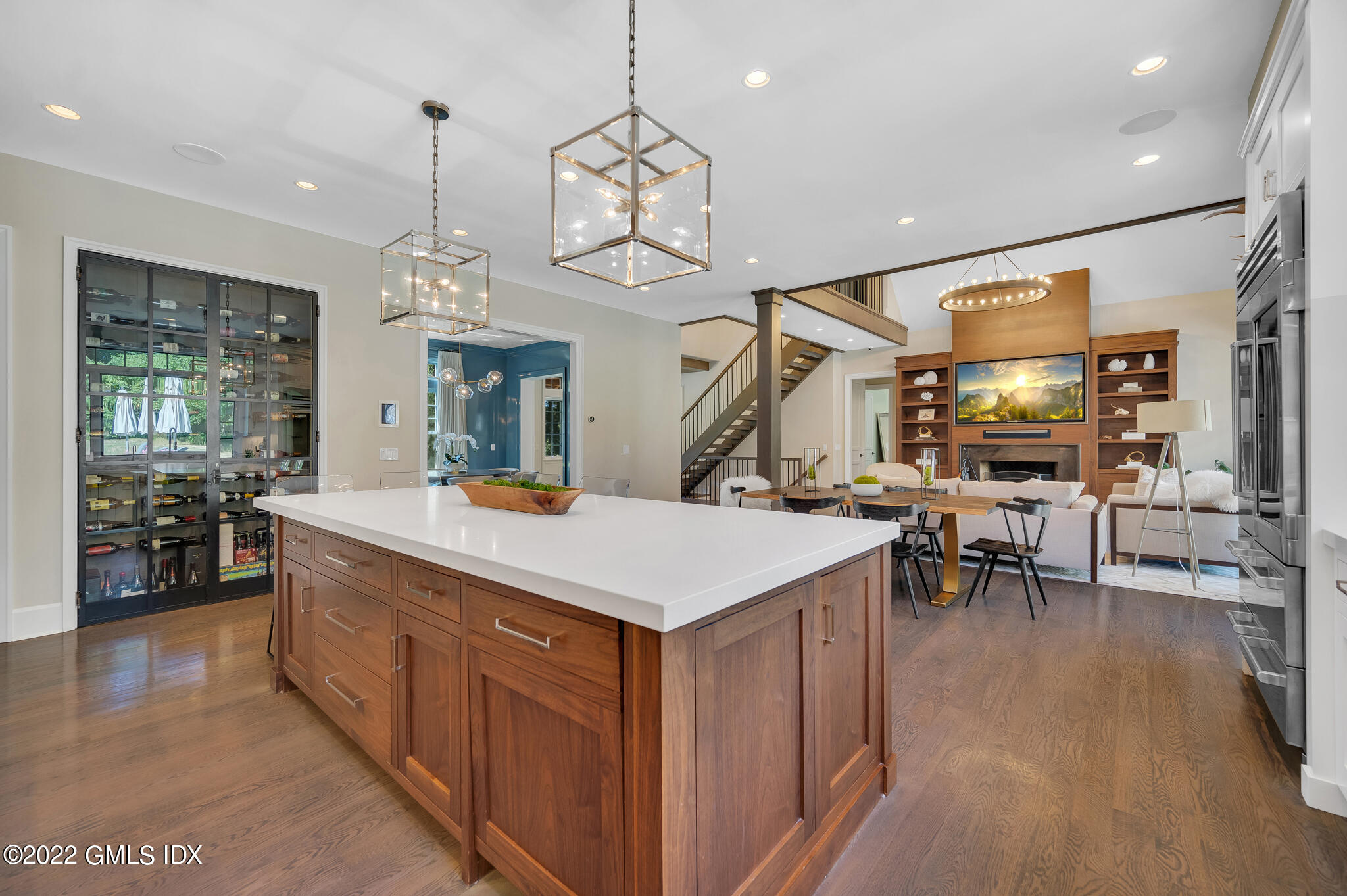 269 Riversville Road Greenwich, CT 06831 - Photo 12 of 55 a large kitchen with a counter space a sink appliances and living room view