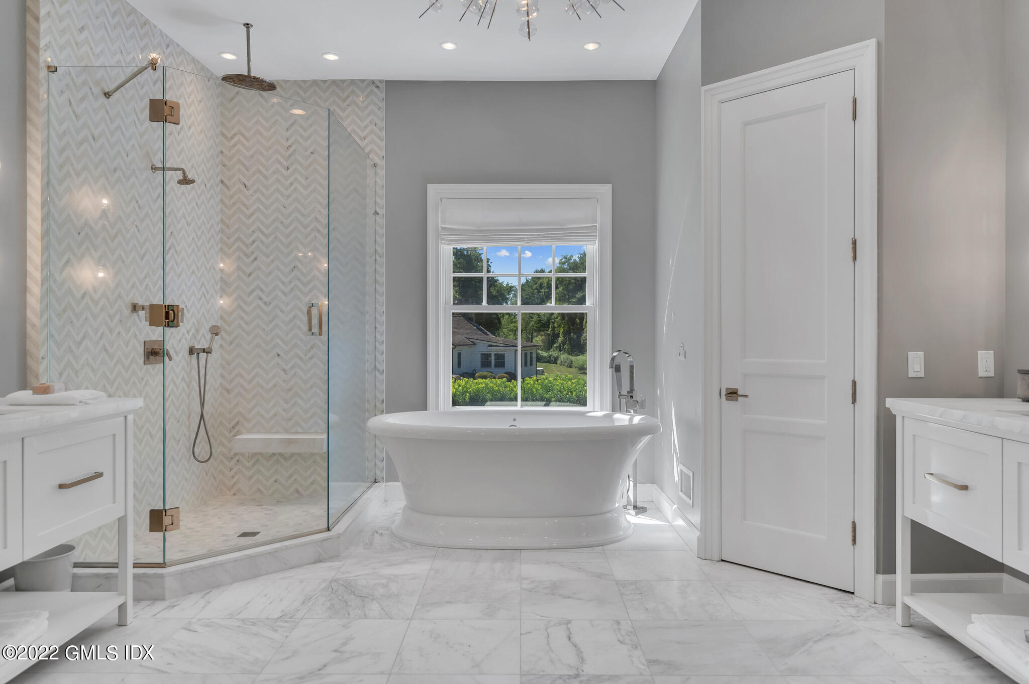 269 Riversville Road Greenwich, CT 06831 - Photo 19 of 55 a bathroom with a bathtub and a shower