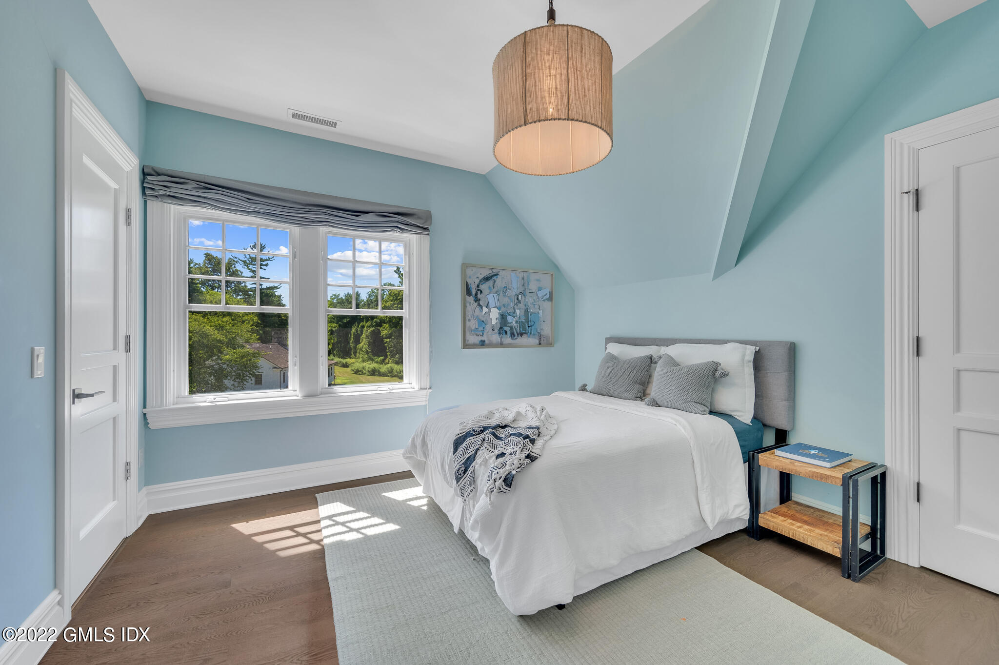 269 Riversville Road Greenwich, CT 06831 - Photo 23 of 55 a bedroom with bed and a window