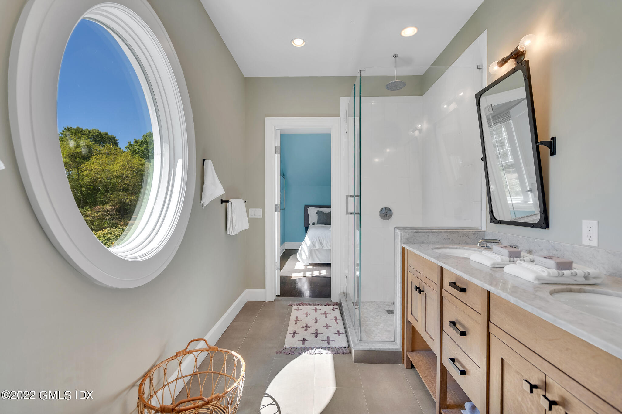 269 Riversville Road Greenwich, CT 06831 - Photo 24 of 55 a bathroom with a granite countertop sink a mirror and a toilet