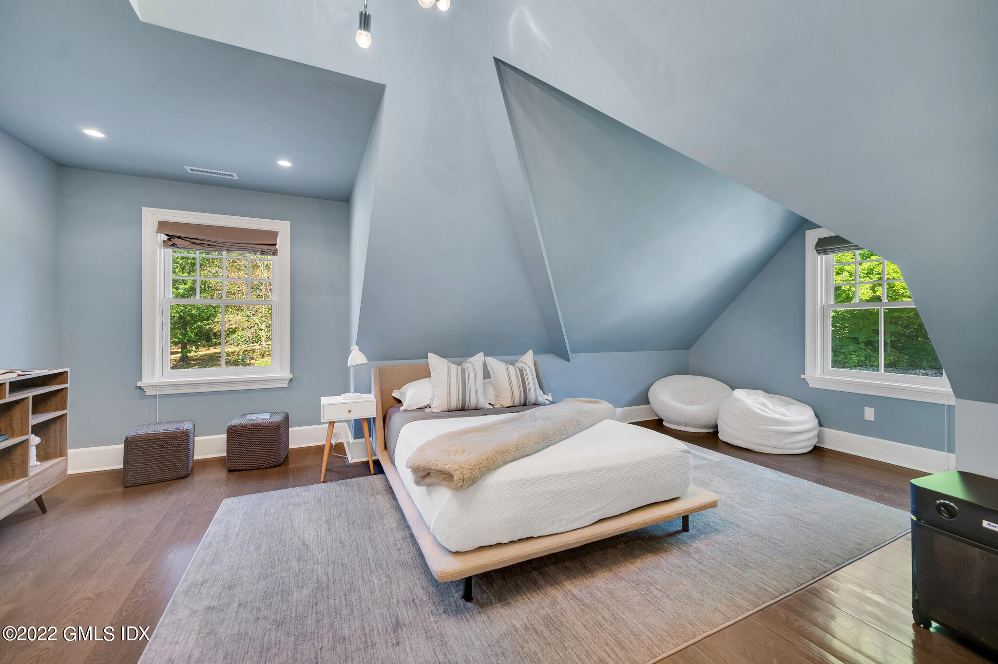 269 Riversville Road Greenwich, CT 06831 - Photo 26 of 55 a bedroom with furniture and a window