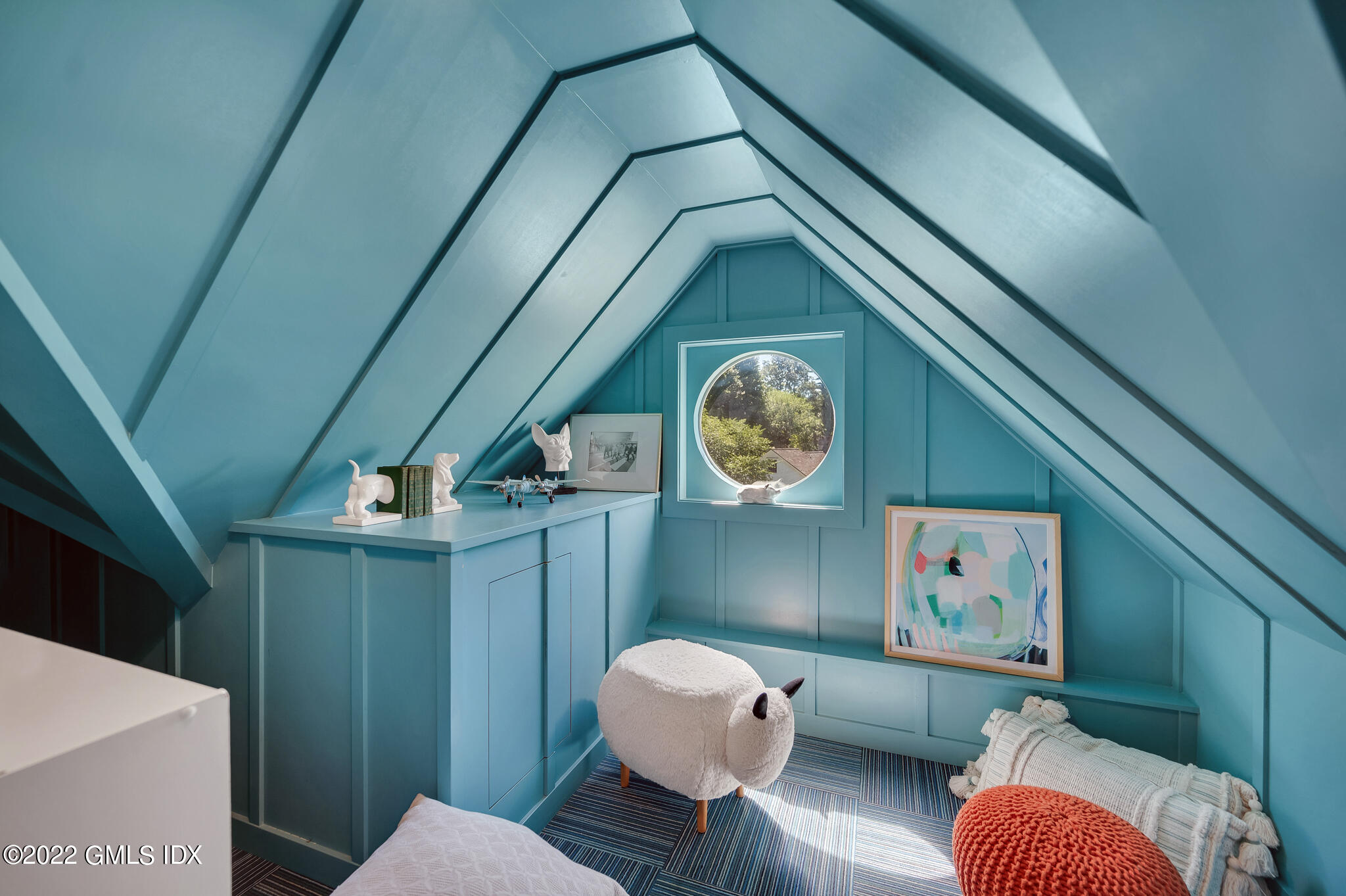 269 Riversville Road Greenwich, CT 06831 - Photo 27 of 55 a living room with furniture and a wooden floor