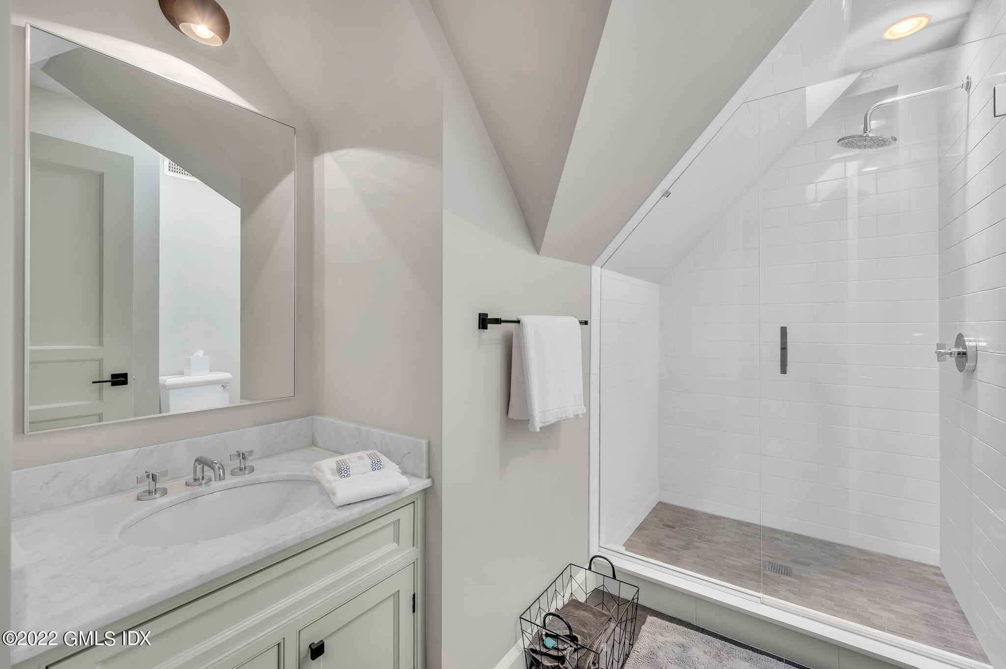 269 Riversville Road Greenwich, CT 06831 - Photo 28 of 55 a bathroom with a granite countertop sink a mirror and a shower