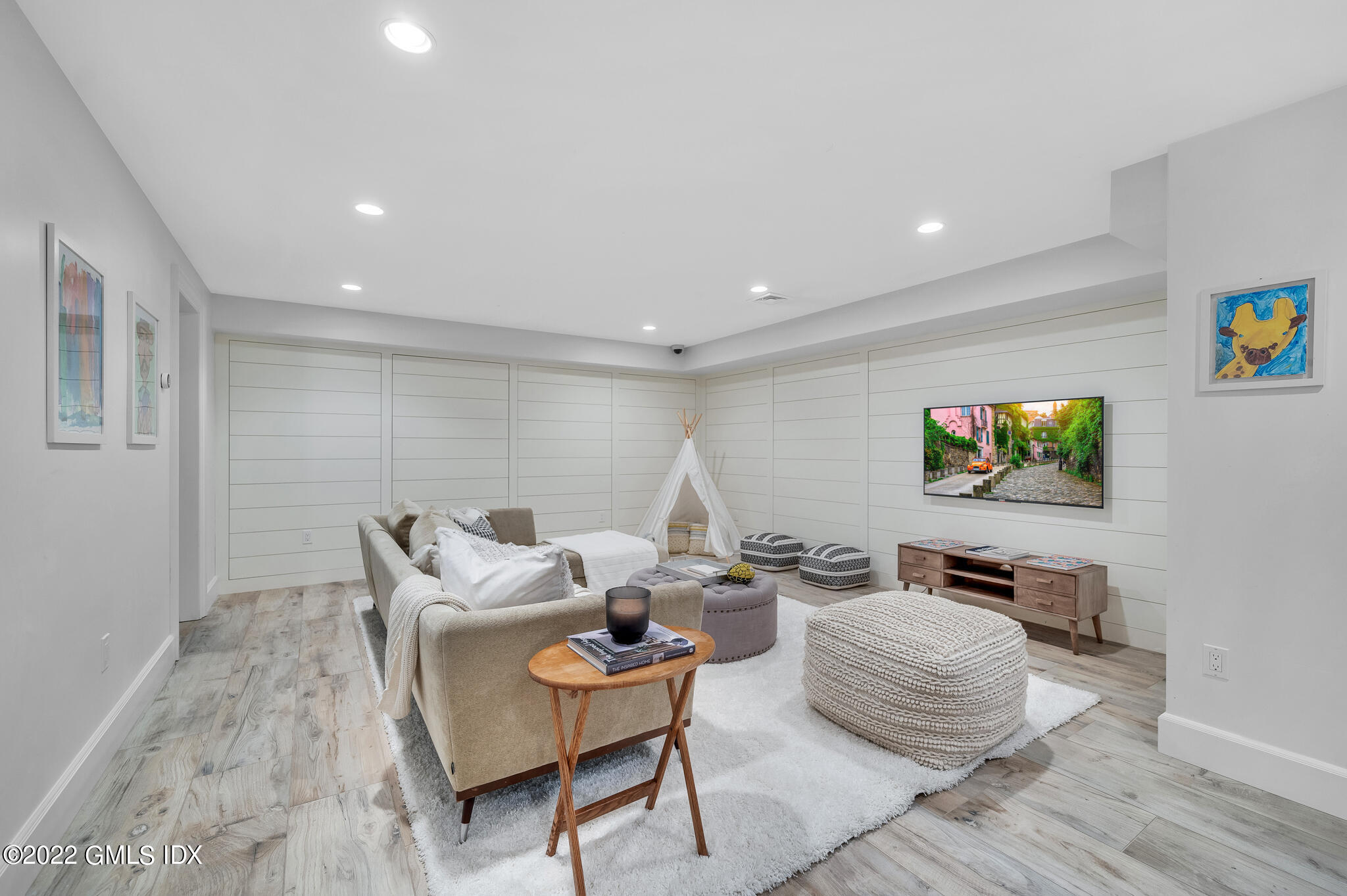 269 Riversville Road Greenwich, CT 06831 - Photo 32 of 55 a living room with furniture and a flat screen tv