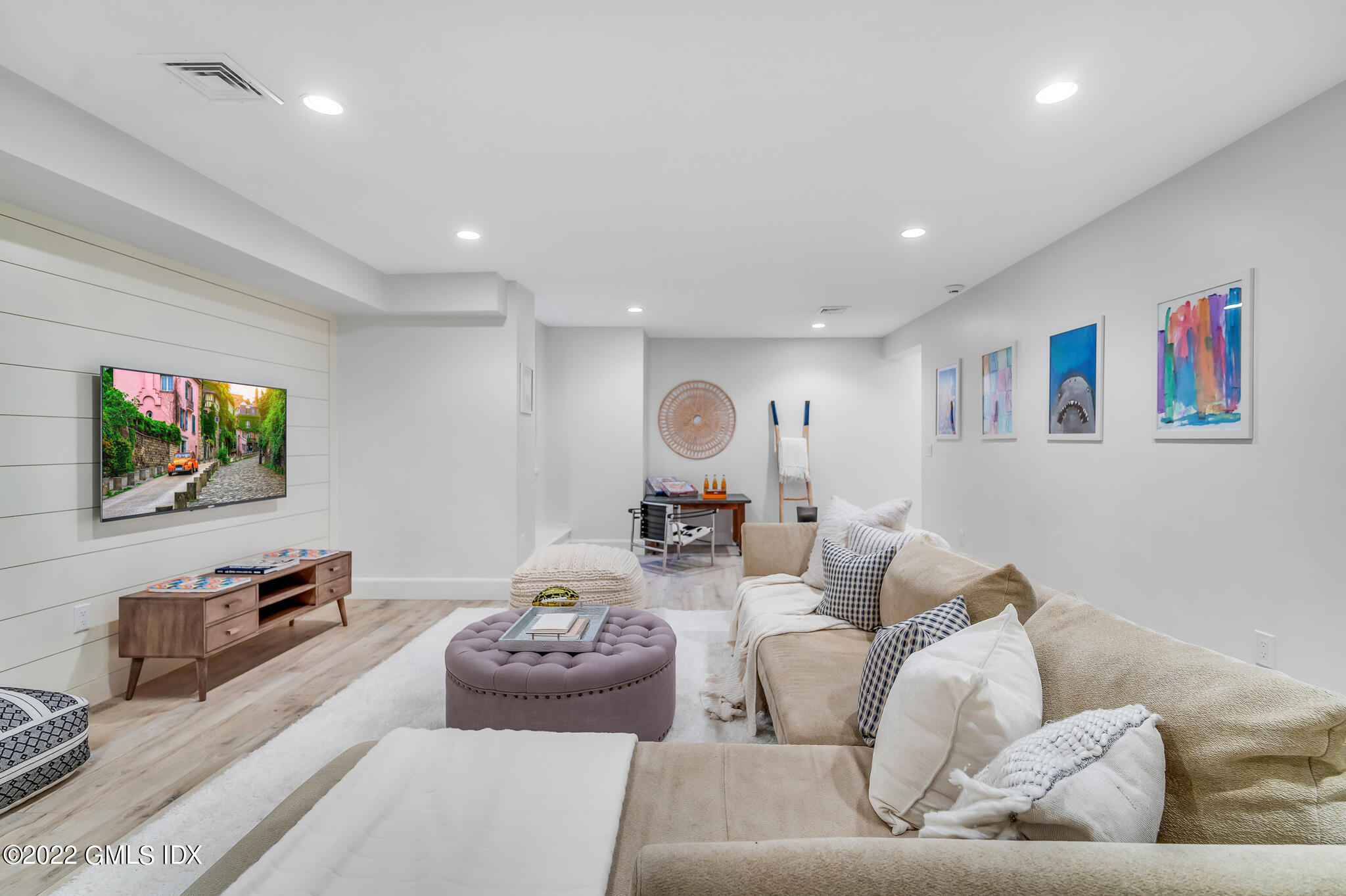269 Riversville Road Greenwich, CT 06831 - Photo 33 of 55 a living room with furniture and a flat screen tv