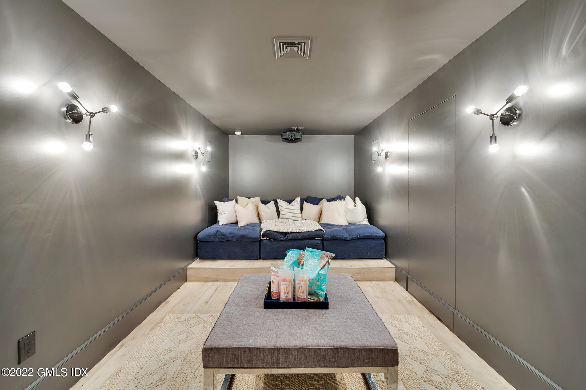 269 Riversville Road Greenwich, CT 06831 - Photo 34 of 55 a living room with furniture and a lamp