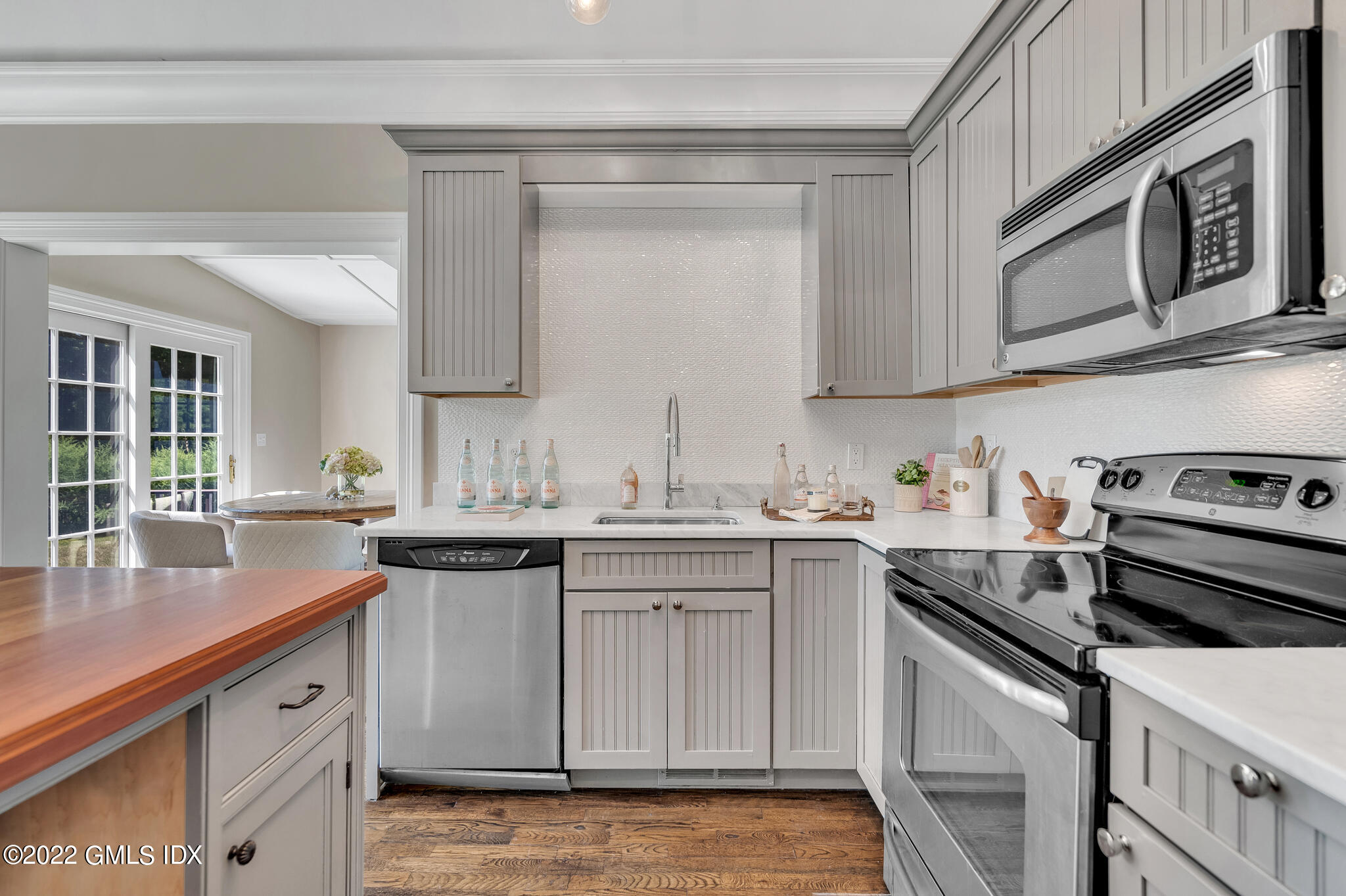 269 Riversville Road Greenwich, CT 06831 - Photo 45 of 55 a kitchen with stainless steel appliances granite countertop a sink stove and cabinets
