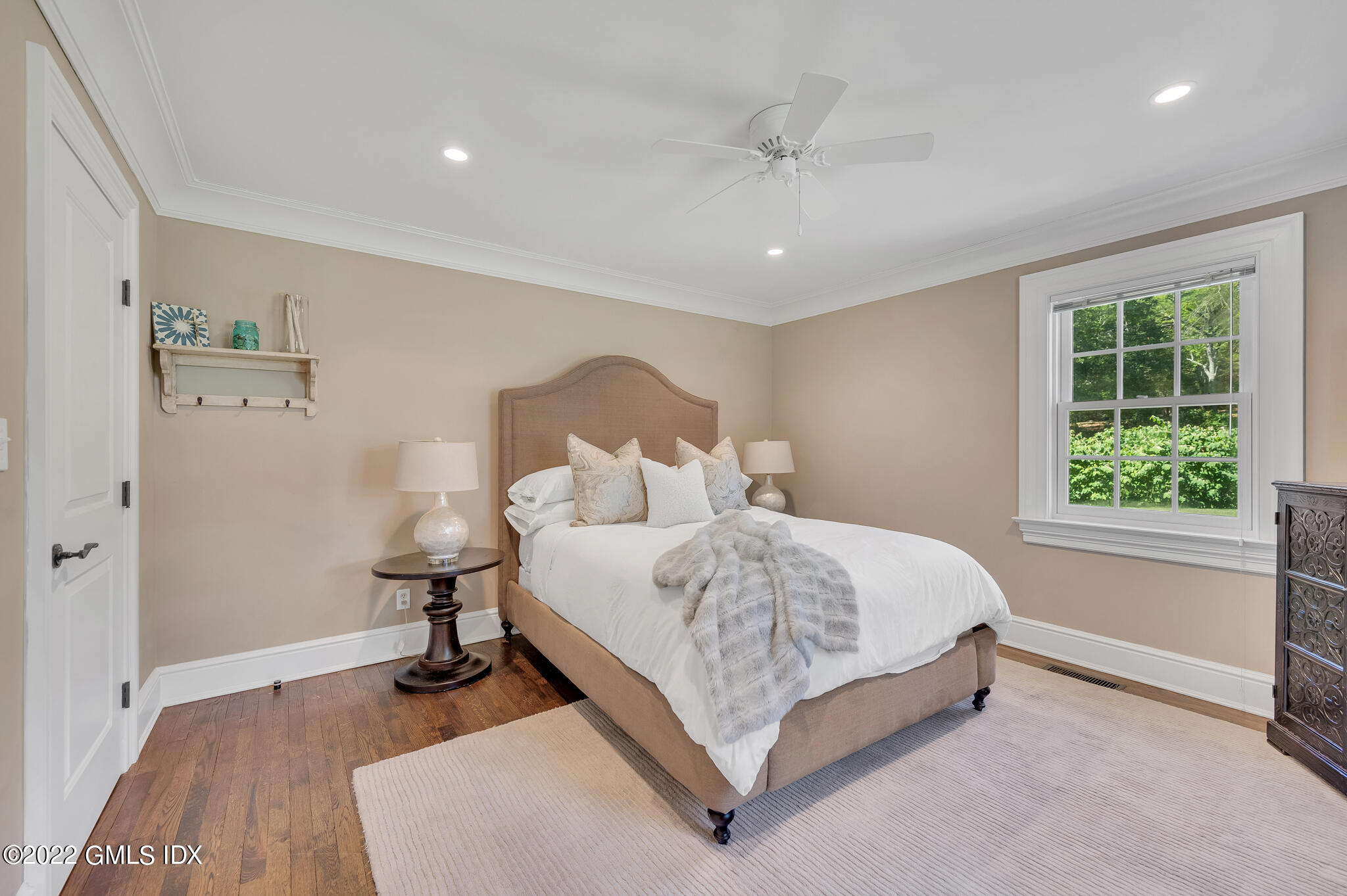 269 Riversville Road Greenwich, CT 06831 - Photo 49 of 55 a spacious bedroom with a bed and a window