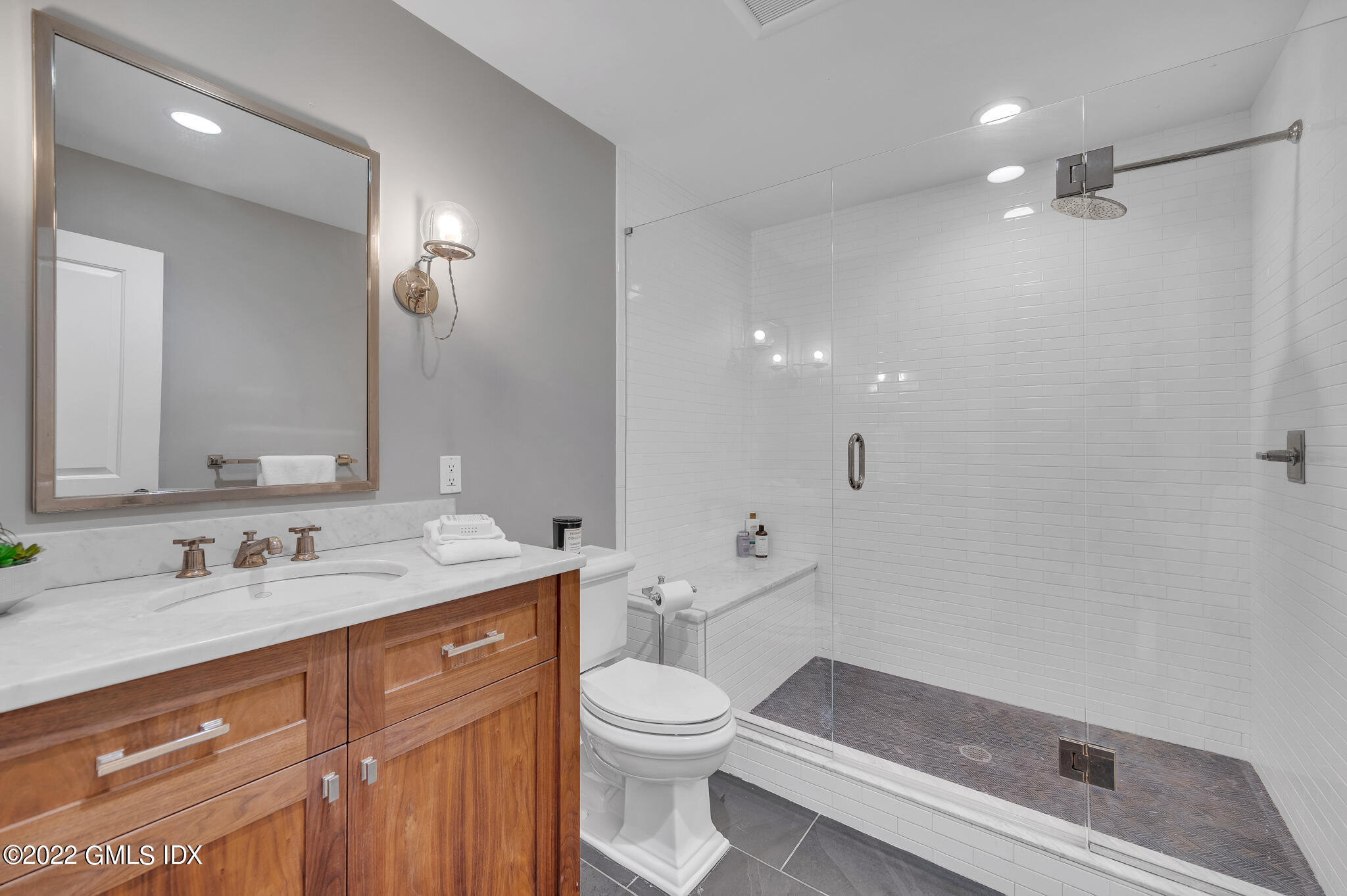 269 Riversville Road Greenwich, CT 06831 - Photo 50 of 55 a bathroom with a sink a toilet and shower