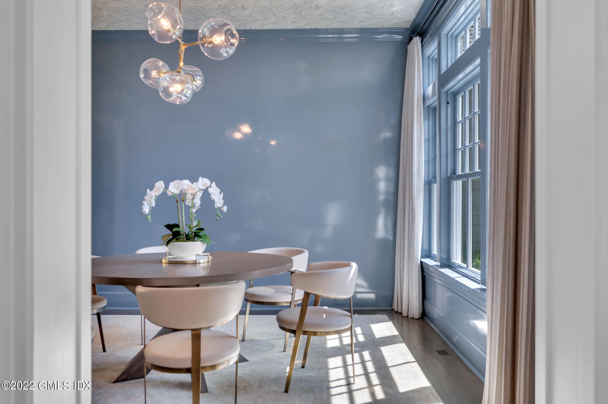 269 Riversville Road Greenwich, CT 06831 - Photo 7 of 55 a dining room filled chandelier and wooden floor