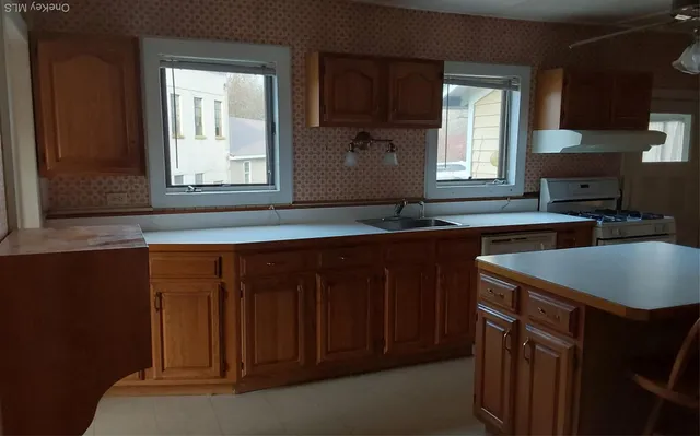 a view of a kitchen from a kitchen